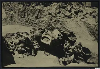 Finds in situ in pit H 14-15 at Mersinaki: vessels and jars lying in excavated soil