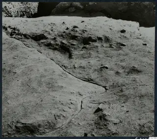 Excavated sand at Mersinaki, with a curving edge showing where a pit meets the natural sand.