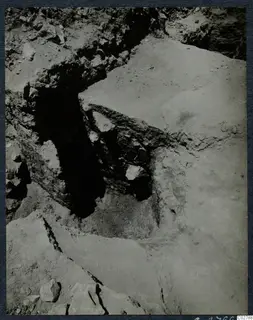 Soil profile in excavation pit E-F 10-11 at Mersinaki, with stones set in the earth section