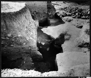 Excavation pit E-F, 10-11 at Mersinaki, with mud-brick walls and cut soil faces