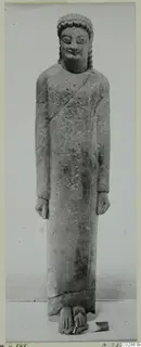Limestone Cypro-Greek I statue of a standing figure in a long garment, Kition