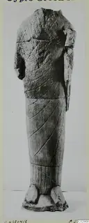 Headless limestone statue of a standing figure in a long garment, from Kition