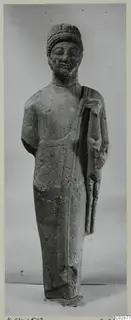 Limestone statue of a standing bearded figure from Kition, seen from the front