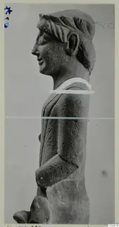 Limestone statue of a figure in profile, facing left, from Kition