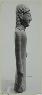Limestone statuette from Kition, a standing figure seen in side profile with a banded hairstyle
