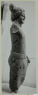 Limestone statuette of a standing figure from Kition, seen in side view