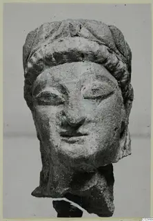 Limestone Cypro-Greek II statuette head from Kition, broken off at the neck