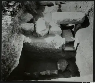 Excavation at Amathus showing a stone construction of large cut blocks and slabs set in a trench