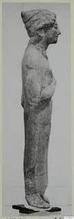 Limestone statue from Vouni, a standing figure shown in profile facing right