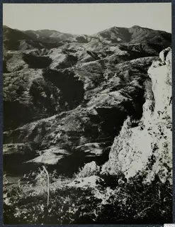 View from a mountain at Vouni towards Galini, with hills and terraced slopes falling away below