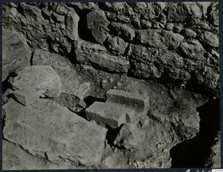 Excavated stone walls and loose blocks at the palace at Vouni