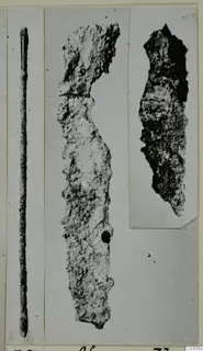 Three corroded toilet requisites from Marion: a thin rod and two flat fragments.