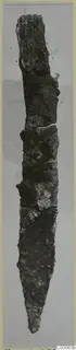 Corroded iron knife with a long pointed blade, find from Marion