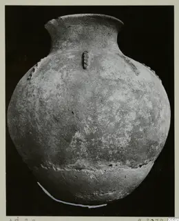 Hand-made pottery jar from Ayios Iakovos with a narrow flaring neck and a round body