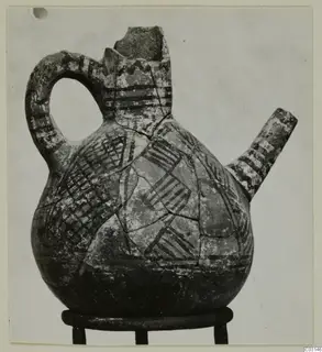 Pottery jug in White Painted I - II style with a strap handle, side spout and dark painted bands