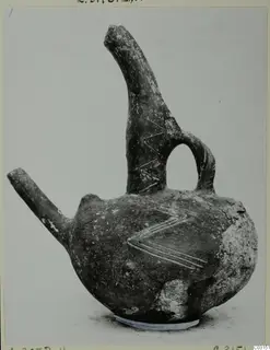 Red Polished III jug from Lapithos with incised chevron decoration