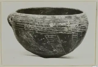 Pottery bowl with a small lug, incised horizontal and diagonal lines, from the Vrysi tou Barba tombs at Lapithos