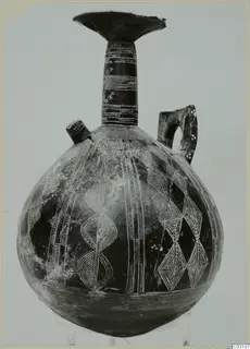 Pottery Red Polished II jug with incised bands and lozenge patterns, from Lapithos.