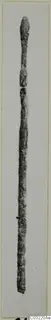 Long thin pin from Marion, photographed upright against a pale background