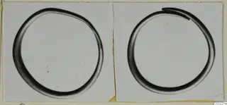 Two photographs of plain rings mounted side by side on a light card; the right ring has one end overlapping the other.
