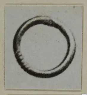Ring from Marion, shown alone in a photograph mounted on a card.