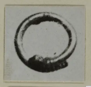 Gold ring from Marion, shown in a small photograph mounted on a pale grey card.
