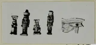 Four small figurines and an eye motif from Marion, shown together on a light background.