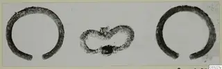 Rings and jewellery from Marion: two open rings flanking a small looped piece.