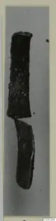 Two pieces of corroded dark metal, one above the other, possibly parts of one broken object, from Marion