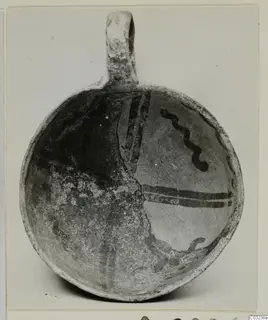 White Painted III vessel with a loop handle, dark painted bands and a wavy line