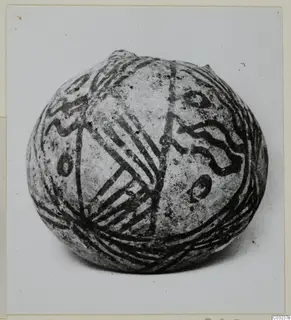 Globular pottery vessel with dark painted wavy bands, hatched lines and small circles, Pottery White Painted III