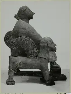 Terracotta figurine of a seated figure with a bearded head and an incised panel, Terracotta Minor Plastic 3 from Ayia Irini