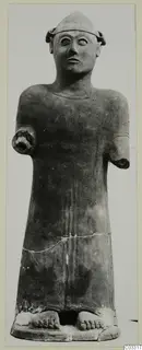 Terracotta standing figure with a close-fitting cap, large eyes and stump arms, Terracotta Proto-Cypriote II