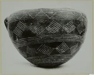Pottery Red Polished II bowl with bands of lines and hatched diamond panels around its body