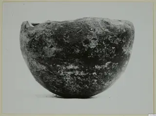 Pottery Red Polished I bowl from the Vrysi tou Barba tombs at Lapithos, shown in side view