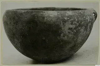 Pottery Red Polished III bowl from the Vrysi tou Barba tombs at Lapithos, seen from the side