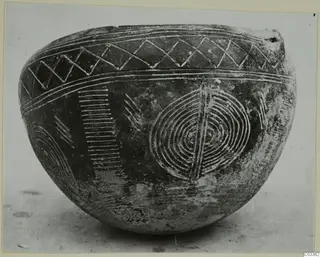 Red Polished II bowl from Lapithos with incised concentric circles and zigzag bands