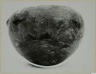 Red Polished II bowl from Lapithos, Vrysi tou Barba tombs, with incised chevron and line decoration