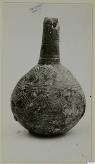 Black Polished pottery vessel with a long narrow neck and zigzag bands, from Lapithos, Vrysi tou Barba tombs