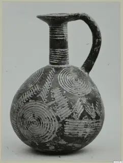 Red Polished II jug from Lapithos with incised concentric circles and chevron bands