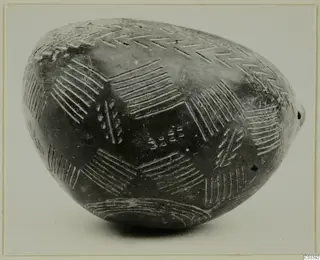 Pottery Red Polished II Bowl from Lapithos, with incised hatched and chevron decoration on a rounded body