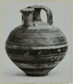 Pottery Levanto-Helladic bowl-jar with a strap handle and banded decoration