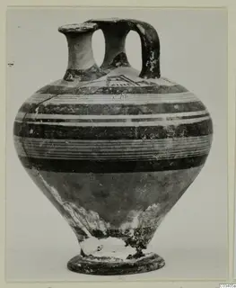 Pottery Levanto-Helladic Ware bowl-jar with painted horizontal bands, photographed against a plain background