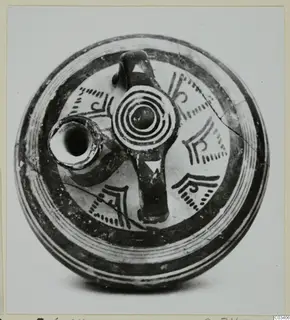 Bowl-jar of Levanto-Helladic Ware seen from above, with a spout, a loop handle and dark painted bands and motifs