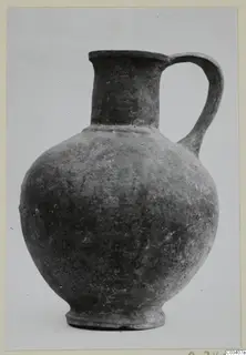 Pottery Base-Ring Ware jug from Enkomi with a globular body, tall neck and single loop handle