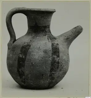 Pottery jug with a loop handle, side spout and dark painted bands on the body, from Enkomi