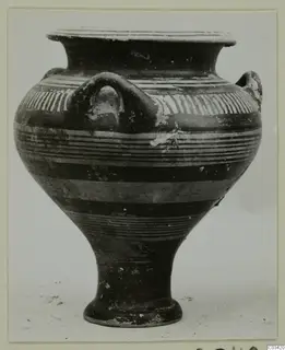 Levanto-Helladic ware bowl-jar from Enkomi with a dark surface and cream painted bands, seen from the side