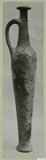 Pottery Red Lustrous Ware vessel from Enkomi, tall narrow body with a single handle
