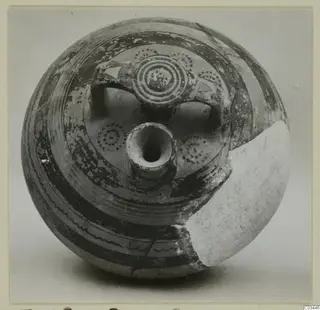 Levanto-Helladic Ware bowl-jar with painted concentric circles and bands, a central spout and a broken section on the right