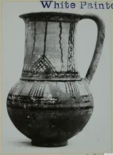 Pottery jug with a single handle and dark painted bands, wavy lines and lattice motifs, from Enkomi
